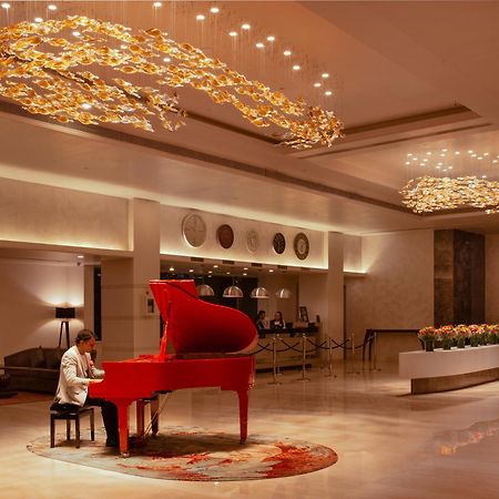 Radisson Blu Bengaluru Outer Ring Road Hotel Bagian luar foto
